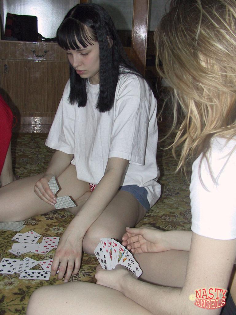 Naughty amateur teens strip naked while playing cards on the carpet(4)