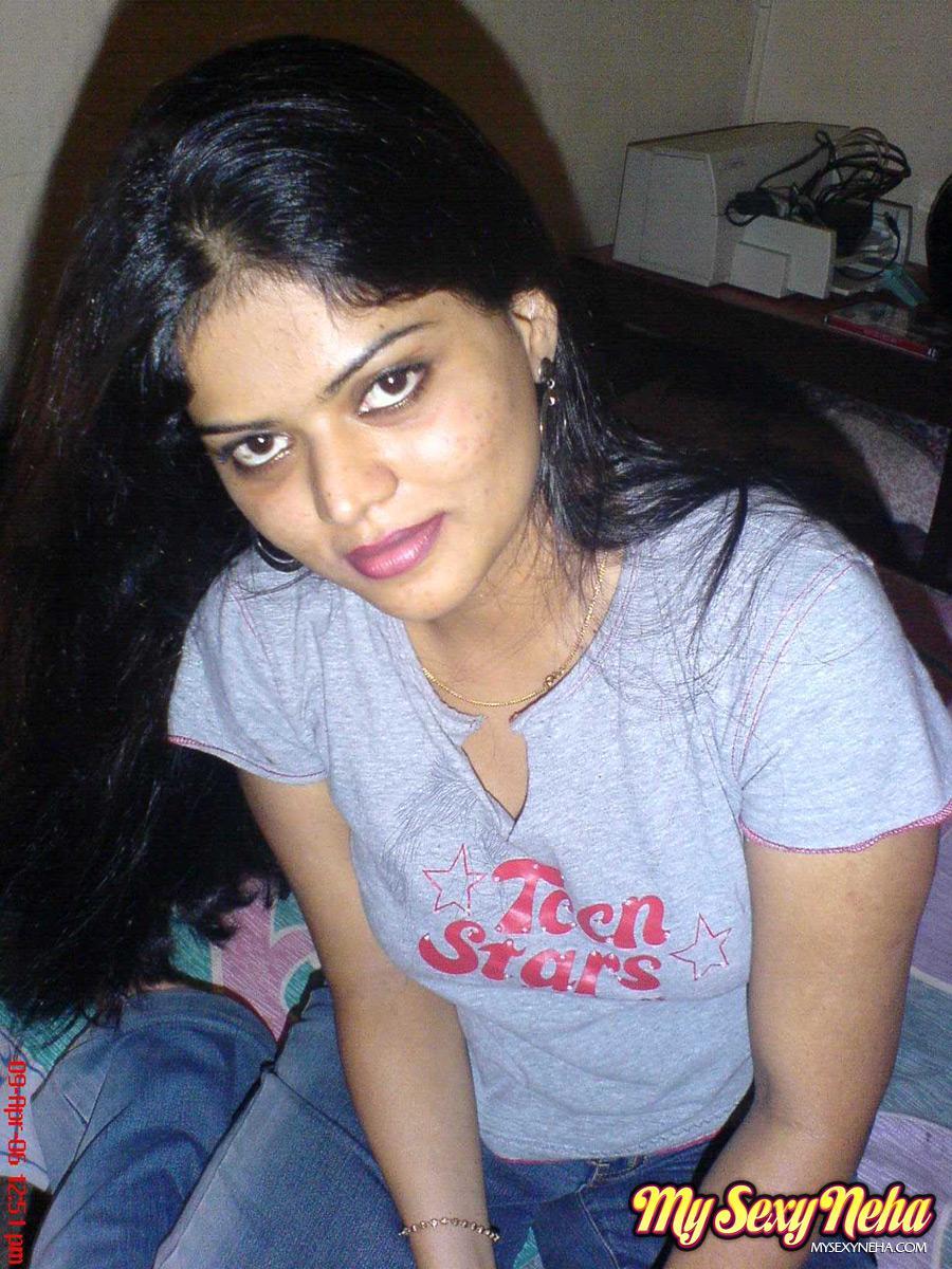 Petite Indian girl uncups big naturals after removing blue jeans(6)