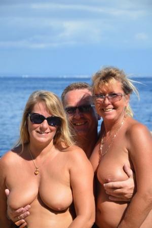 Chubby naked Sweet Susi indulging doggystyle in sizzling beach threesome