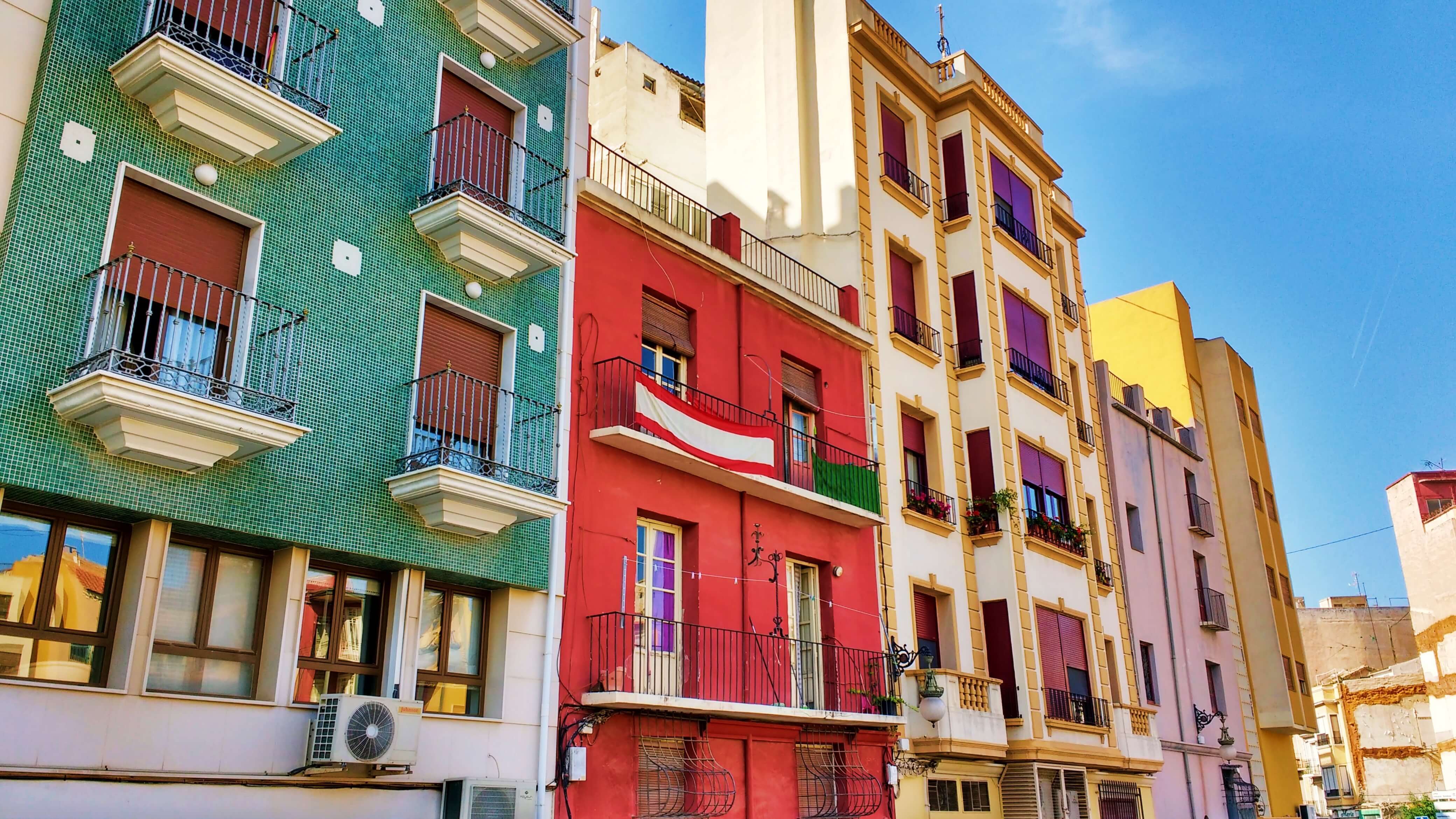 A row of brightly coloured buildings