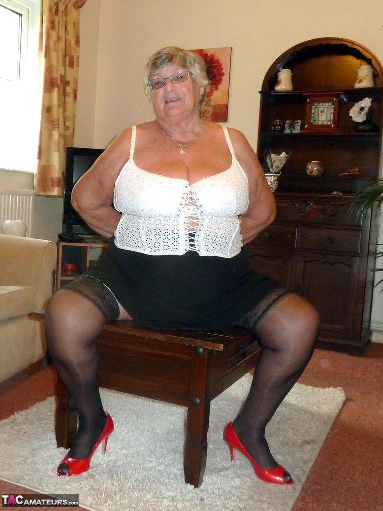 Obese oma Grandma Libby uncovers her large boobs in her underwear and hosiery(8)