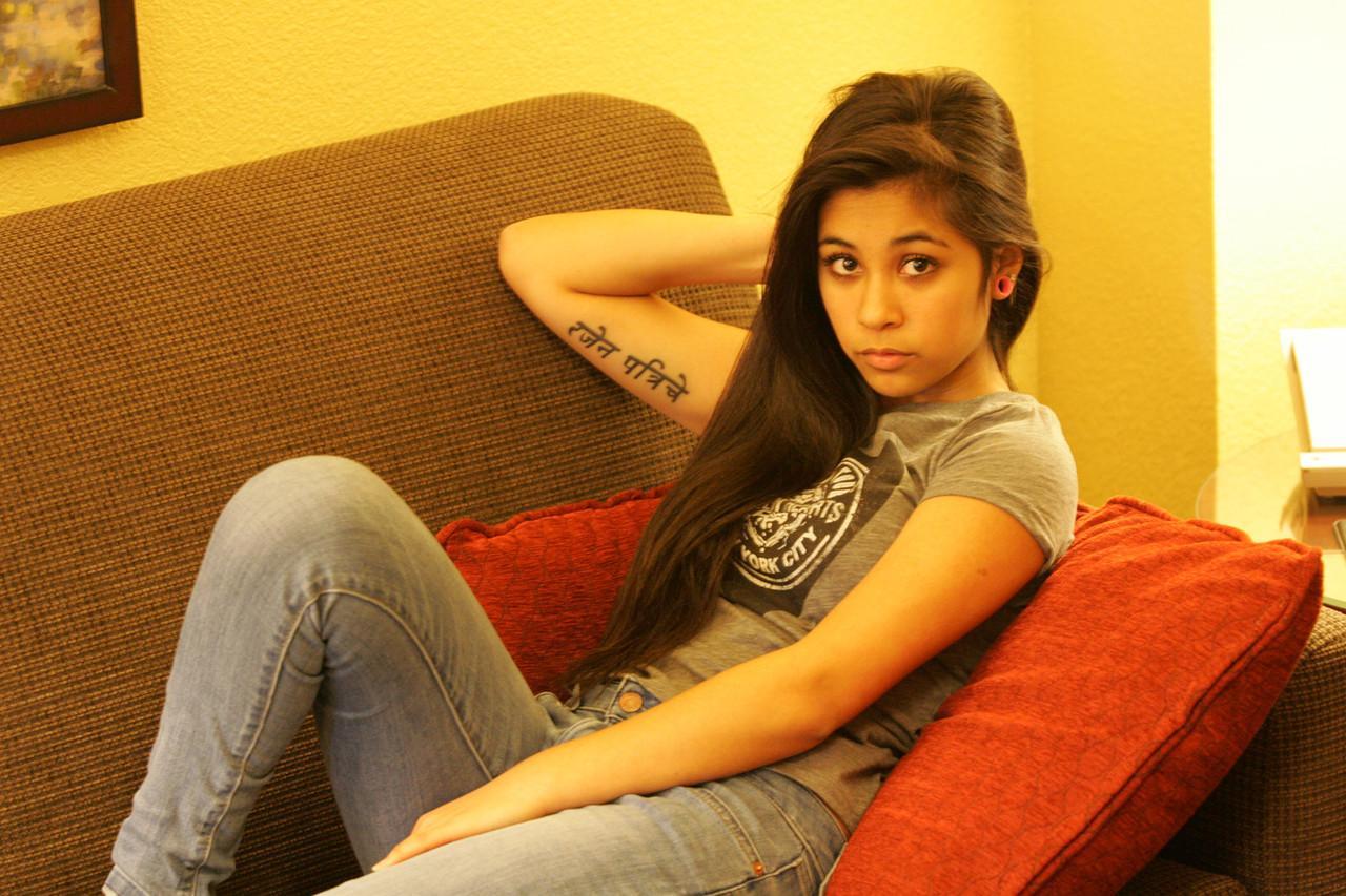 Beautiful Arab teen model posing in her shirt and tight jeans at a casting(1)