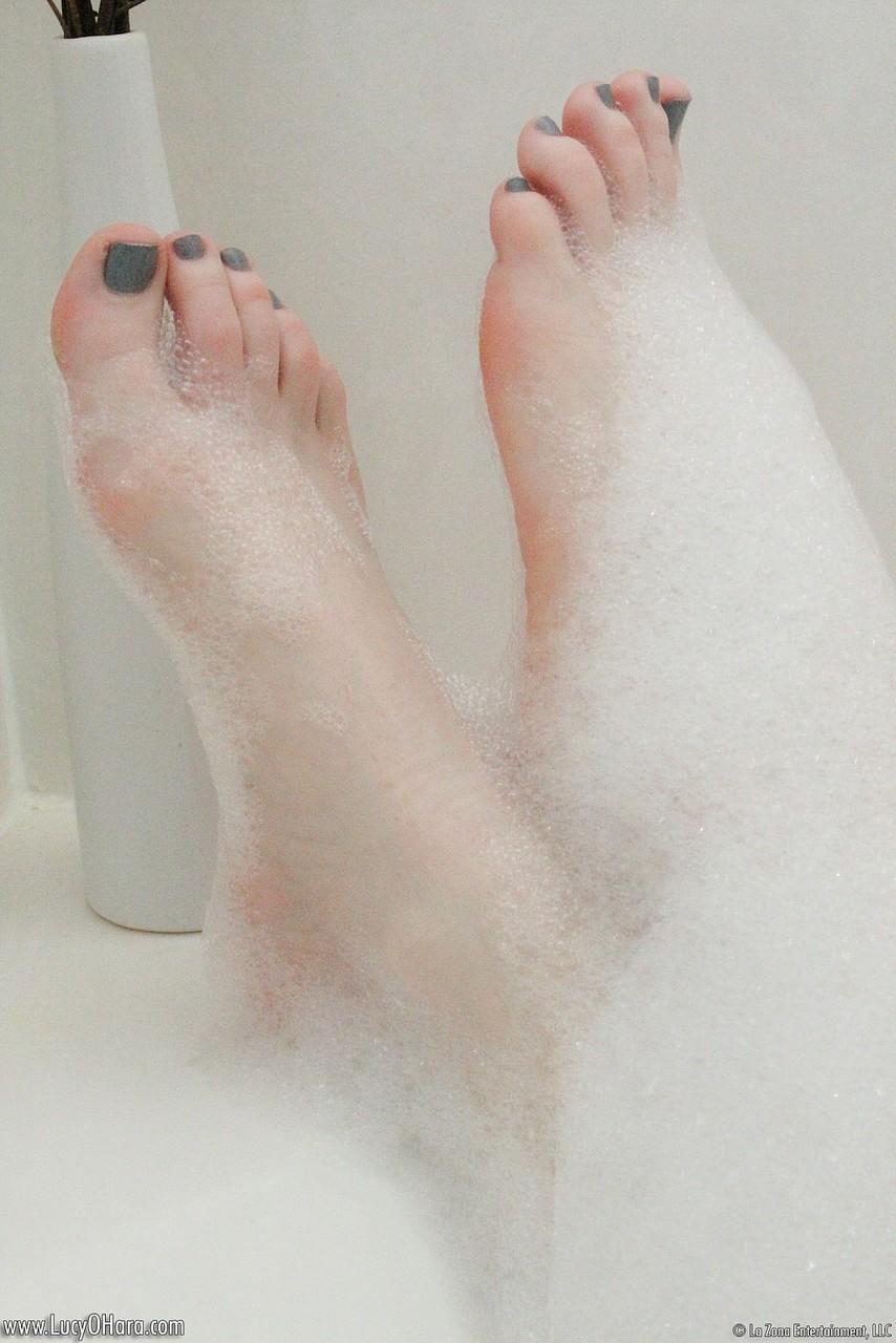 Pale redhead Lucy OHara lathering up her sweet perky tits & toes in the shower(10)