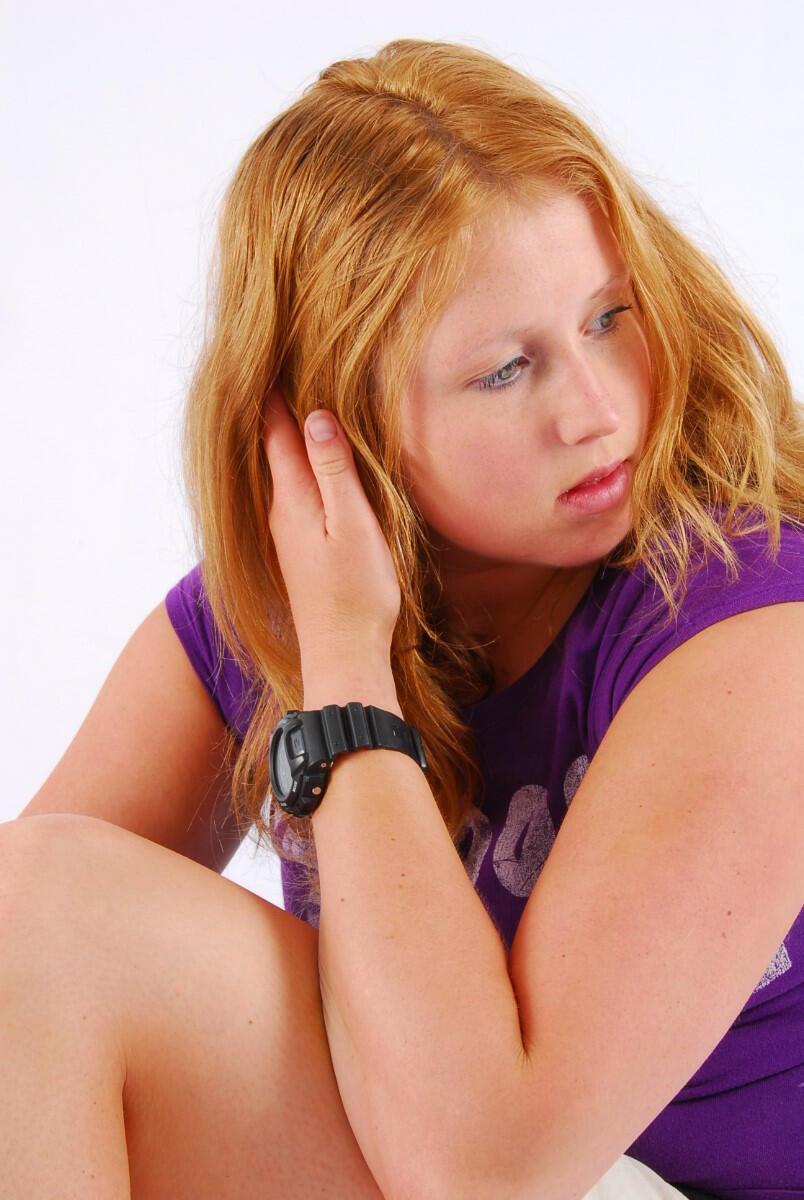 Natural redhead Judy models a black G-Shock watch while fully clothed(1)