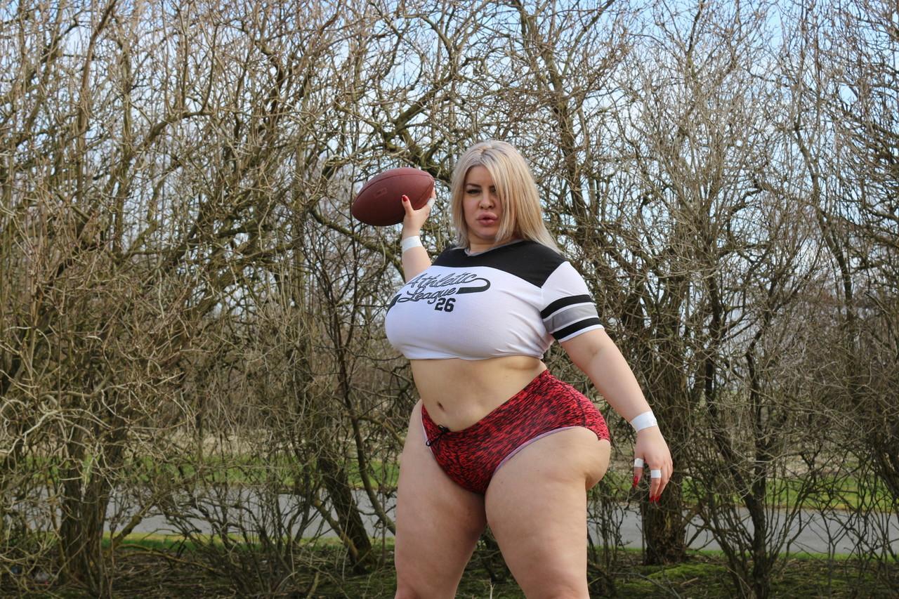 Curvaceous football player Natasha Crown flaunts her huge ass outdoors(13)