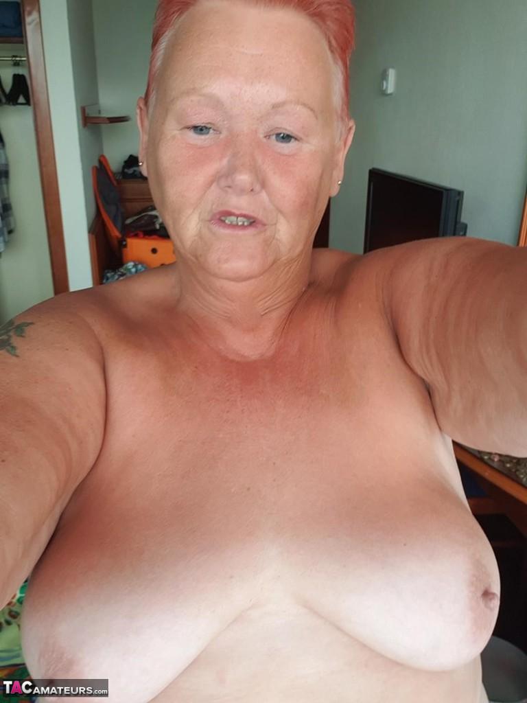 Fat granny with red hair Valgasmic Exposed takes naked selfies at home(17)