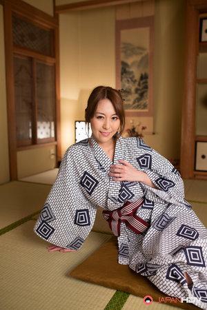 Japanese beauty Akari Asayiri teases in a kimono as well as a summer dress