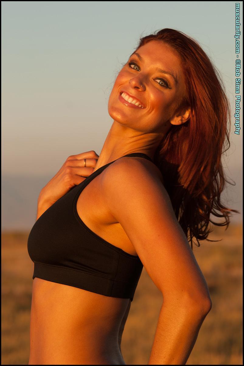 Fit redhead Tierney Flickler changes from a bikini into athletic wear(12)