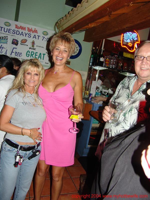 Slutty mature wives go wild and show off their big boobs at the bar(2)