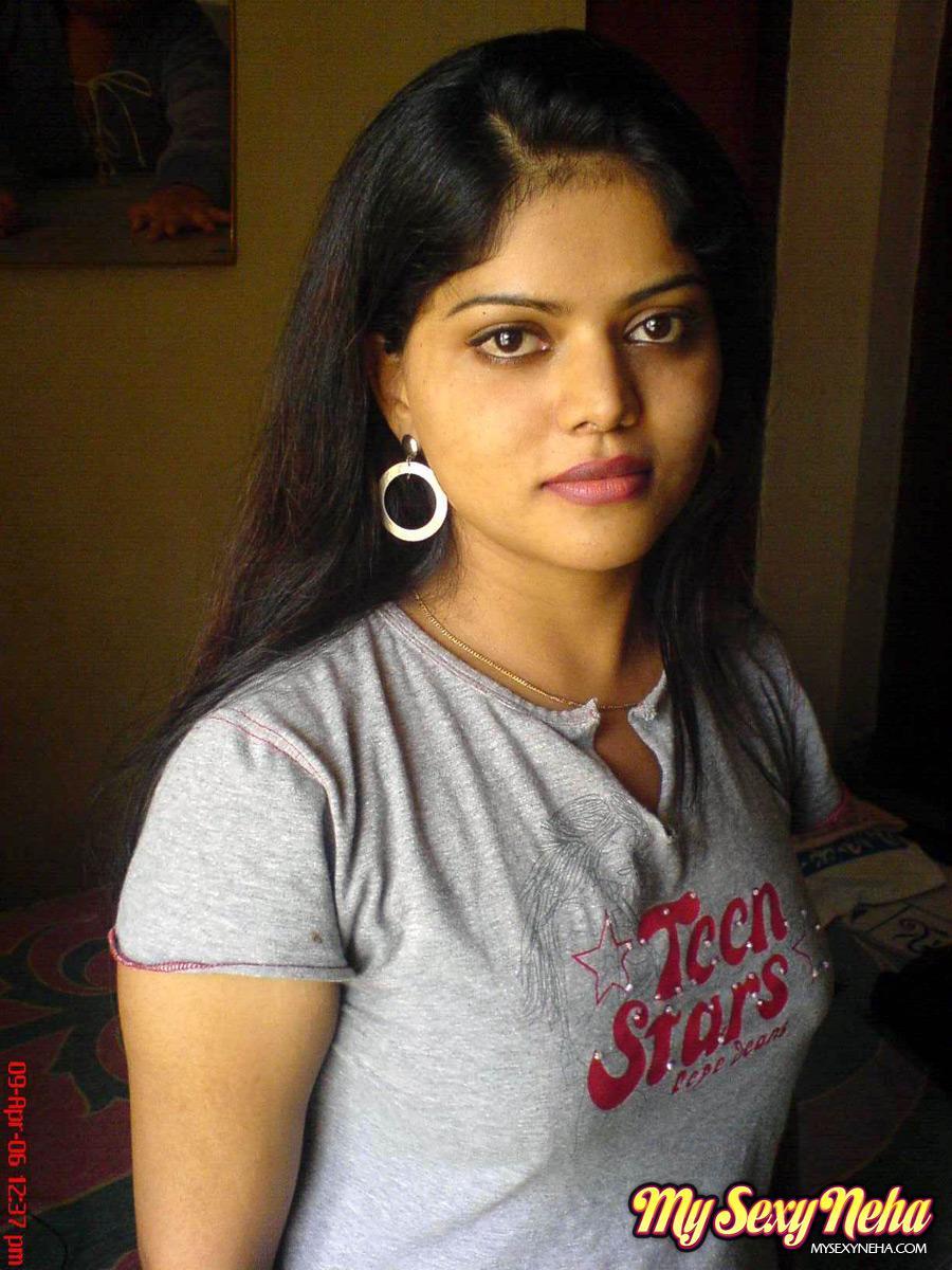 Petite Indian girl uncups big naturals after removing blue jeans(2)