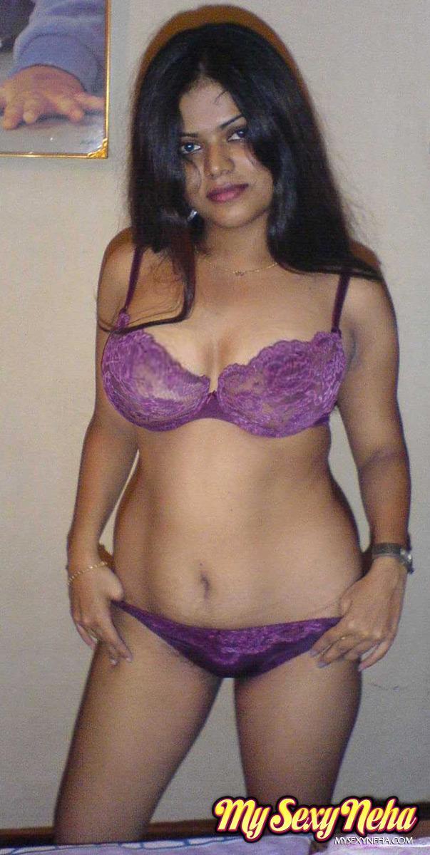 Petite Indian girl uncups big naturals after removing blue jeans(9)