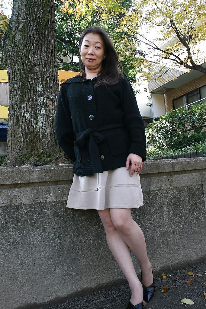 Outdoor posing scene featuring horny Asian mature Yoshiko Makihara(7)