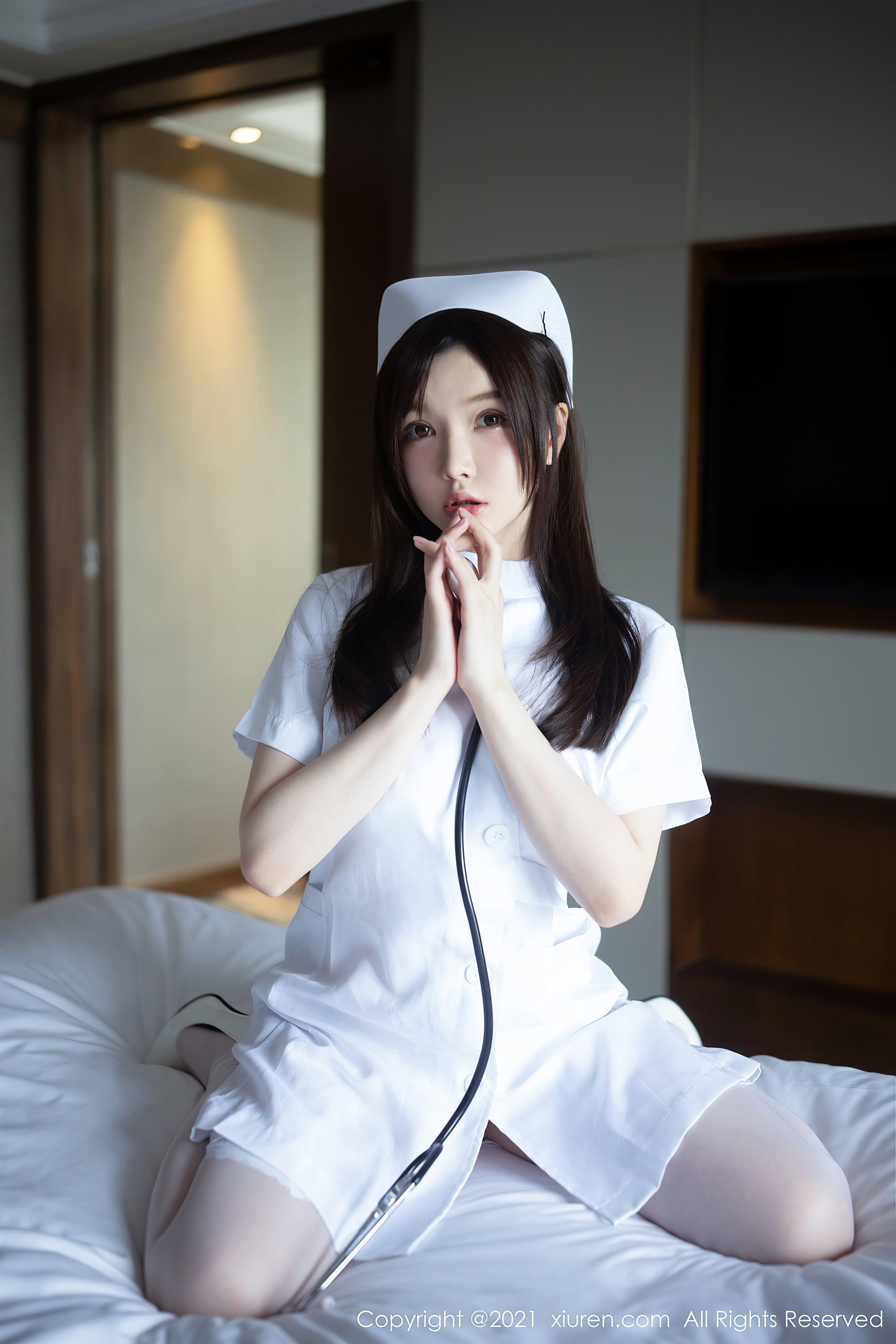 [XiuRen秀人网]No.3114 女神糯美子Mini洁白护士制服主题私房蕾丝内衣秀豪乳翘臀诱惑写真(10)