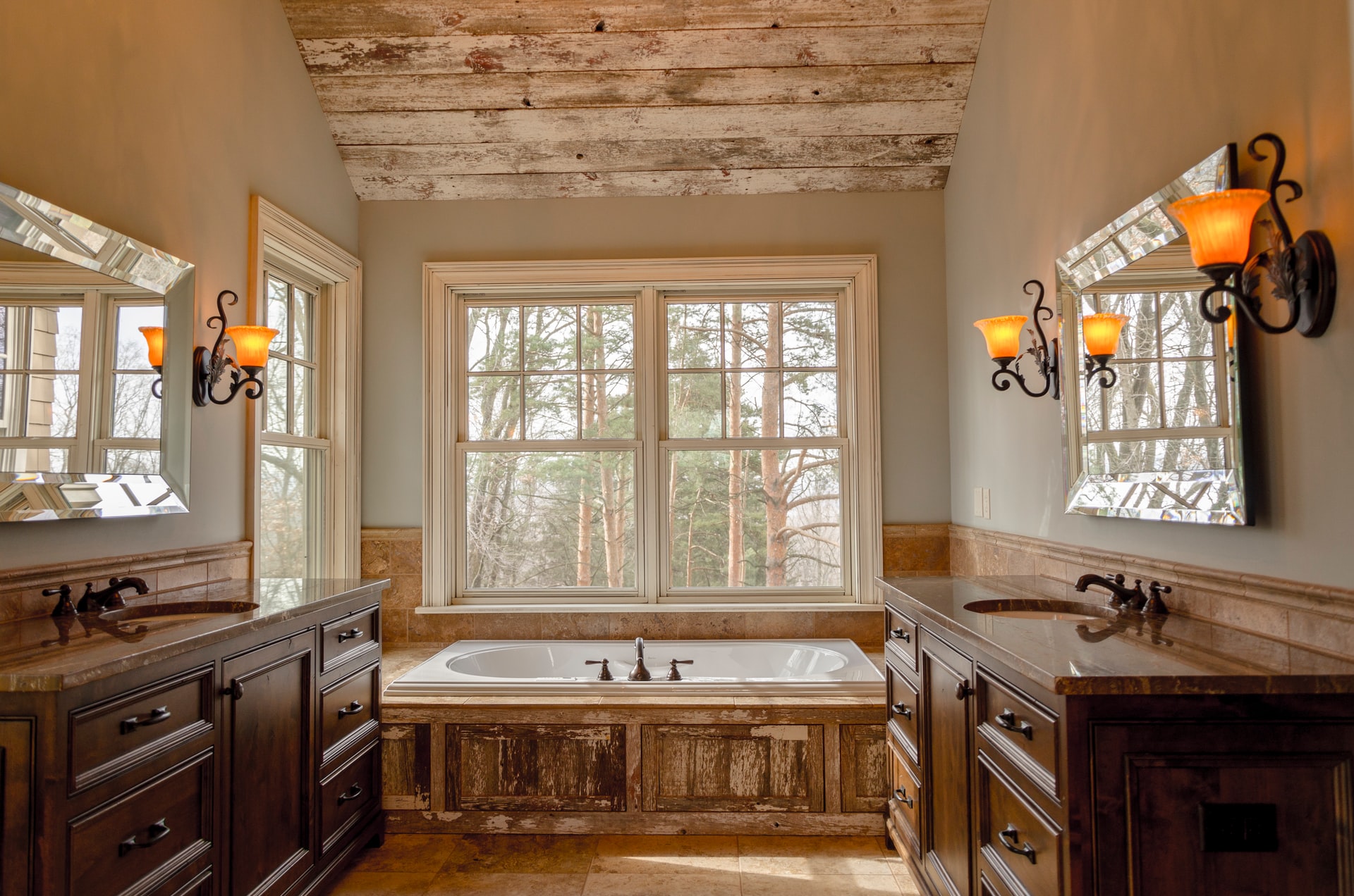Rustic bathroom with view over pine forest