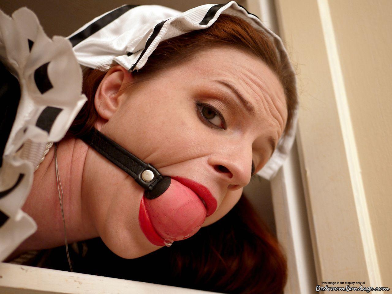 Caucasian maid Claire Adams finds herself ballgagged and bound in closet(13)