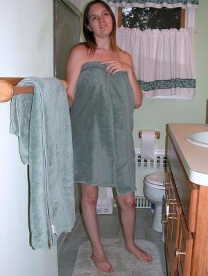 Brunette amateur Natalie washes her curvy body & toys herself in the bathtub