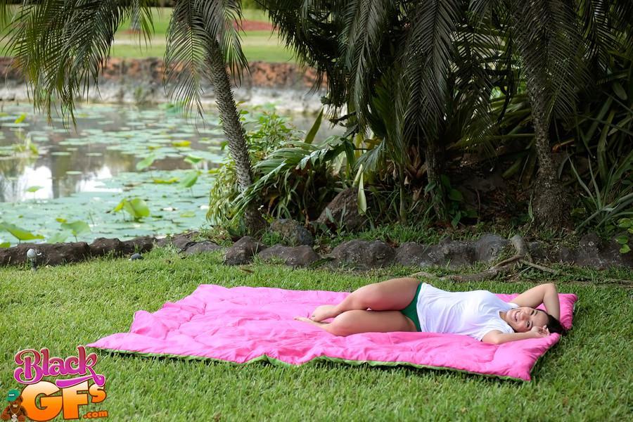 Busty Latina wets herself down in the fountain wearing a white t-shirt(2)