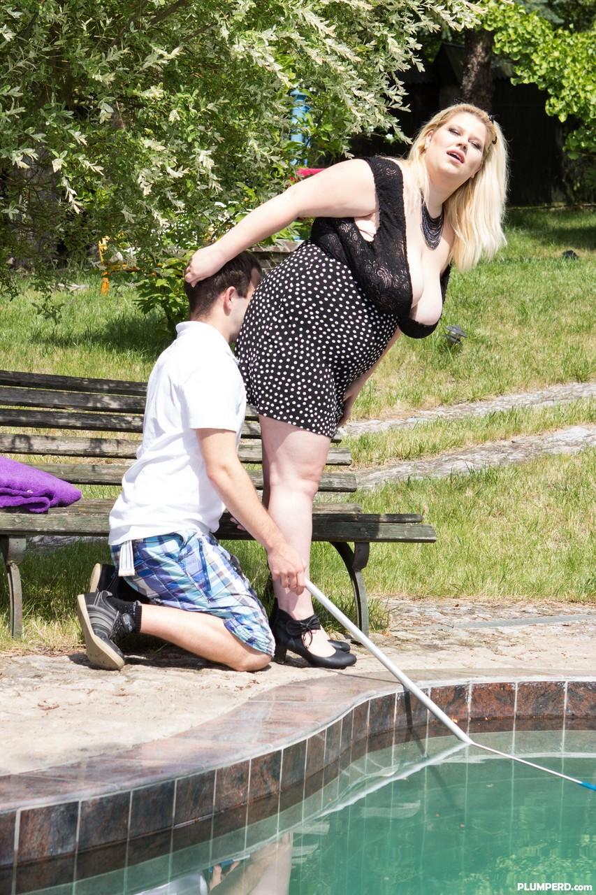 Obese blonde woman sits on the pool boy's face after seducing him(4)