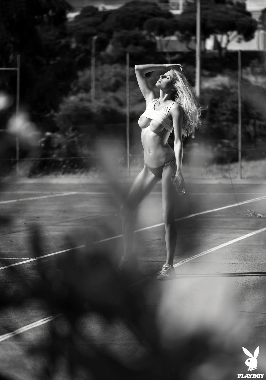 Blonde Playboy muse Olga De Mar flashes her exotic boobs on the tennis court(15)