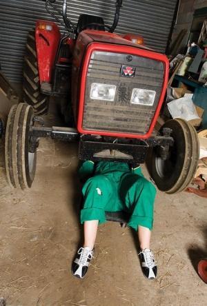 Redheaded farmer Lara Lee strips & fucks herself with a dildo on her tractor