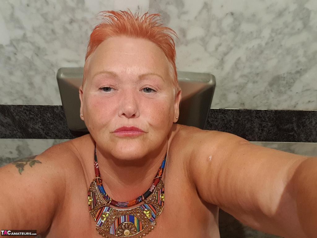 Fat granny with red hair Valgasmic Exposed takes naked selfies at home(19)