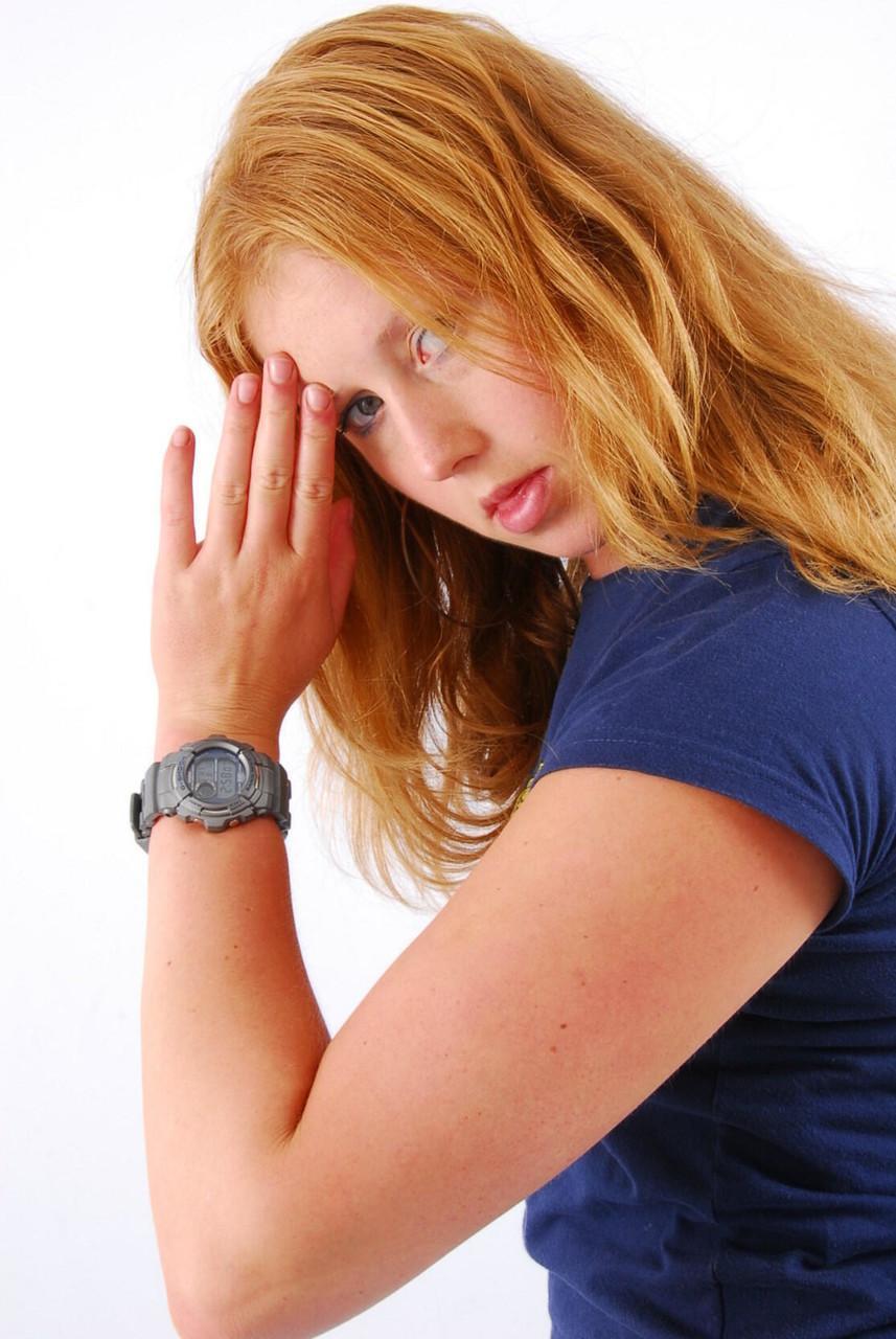 Natural redhead Judy displays her grey G-Shock watch in a T-shirt and jeans(8)