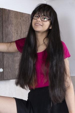 Nerdy cutie in glasses Joaquina unveils her hairy twat & poses in the kitchen