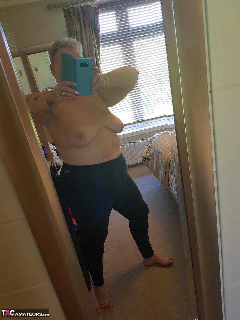 Fat granny with red hair Valgasmic Exposed takes naked selfies at home(14)