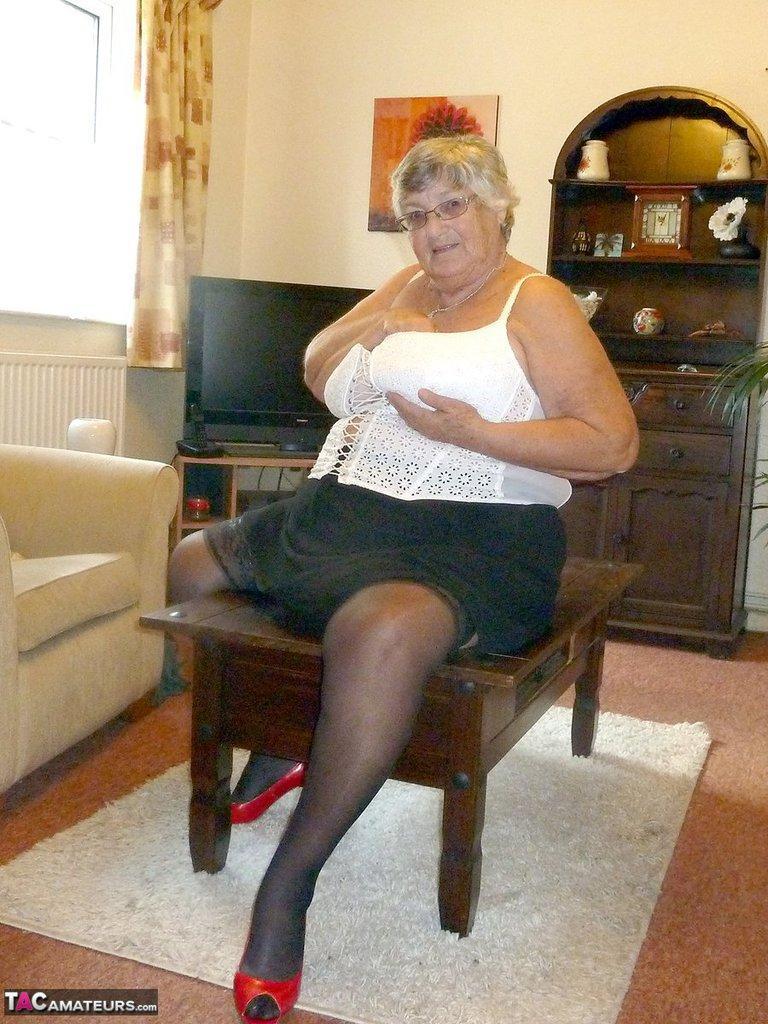 Obese oma Grandma Libby uncovers her large boobs in her underwear and hosiery(9)