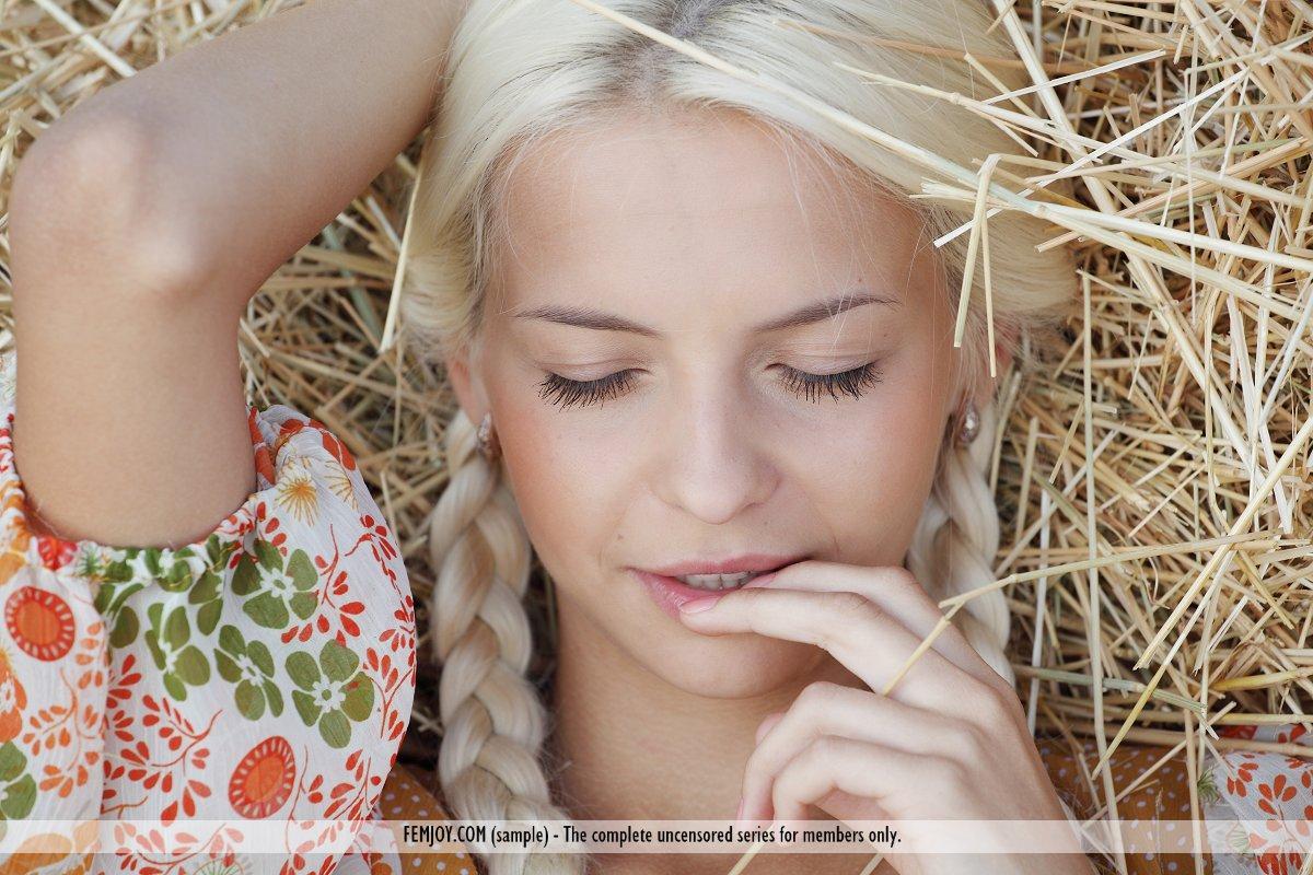 Young cutie Vika D in pigtails pours milk on her bald pussy in the hay stack(2)