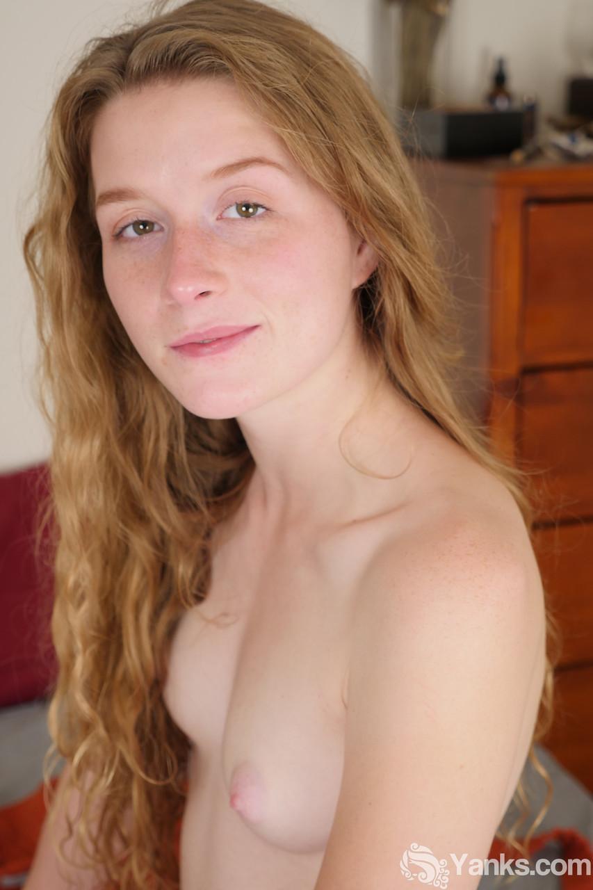 Pale redhead Karina Pontiac slips off her robe to model totally naked on bed(14)