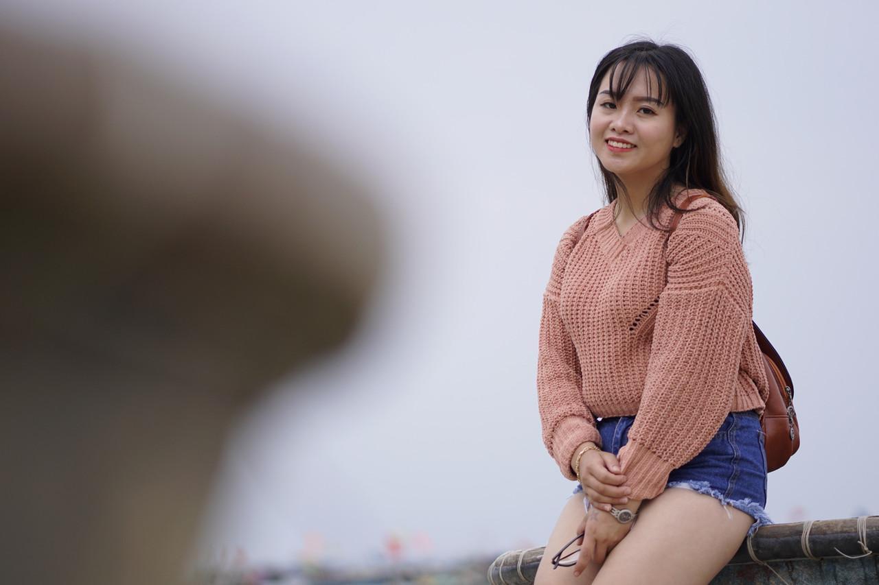 Stunning Asian babe poses in her jean shorts & sweater in public(8)