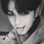 Icon of Teddy. Black and white. He is looking at the camera and sticking his tongue out teasingly.
