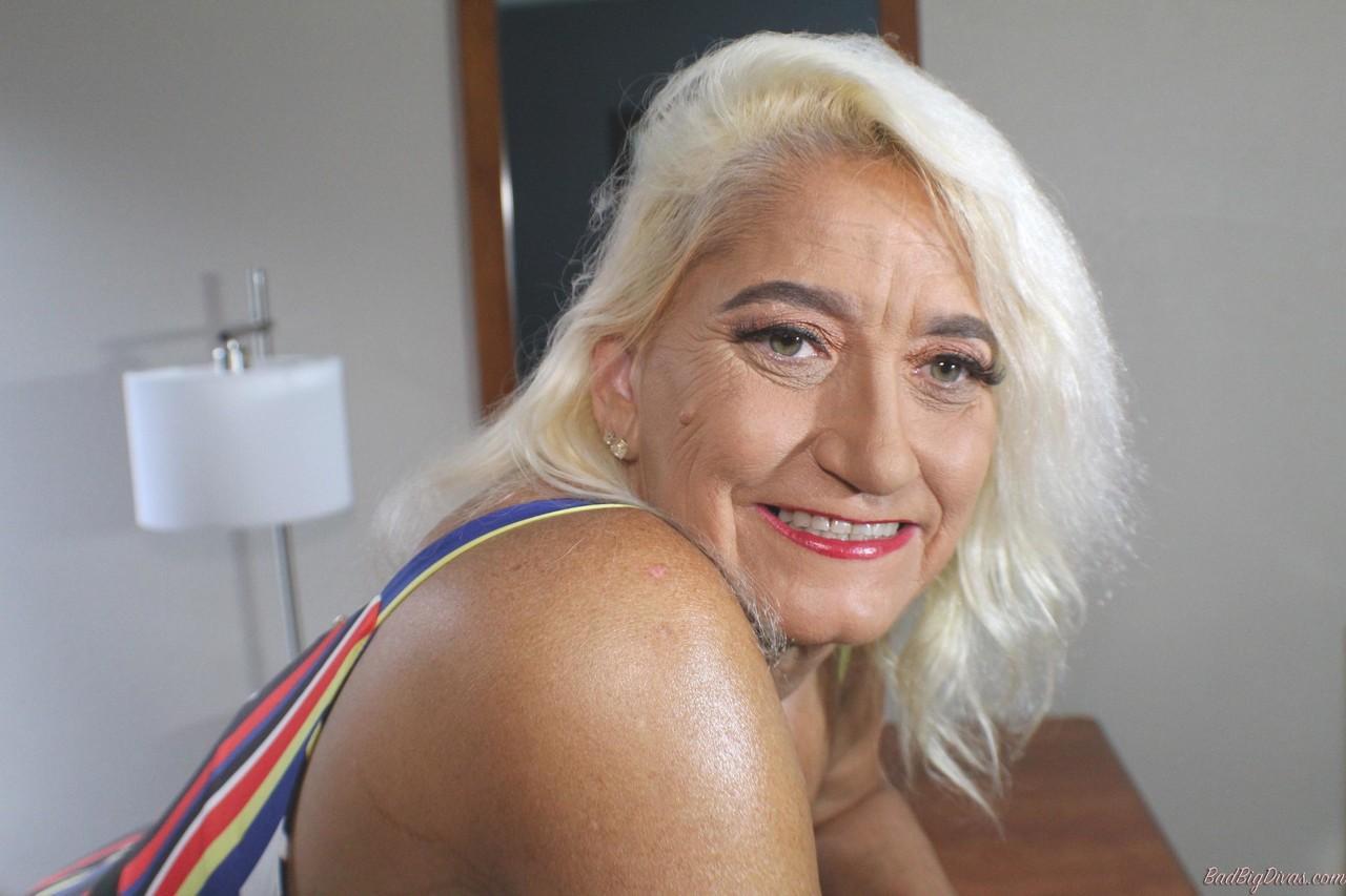 Blonde granny Amber Conners hikes her dress up to show her massive ass(8)