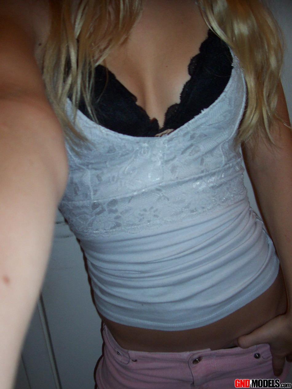 Blonde amateur Kylie takes mirror selfies while disrobing to her bra and thong(2)