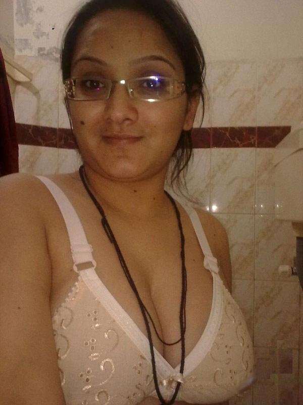 Overweight Indian student shows her bare mid-section in a brassiere(5)