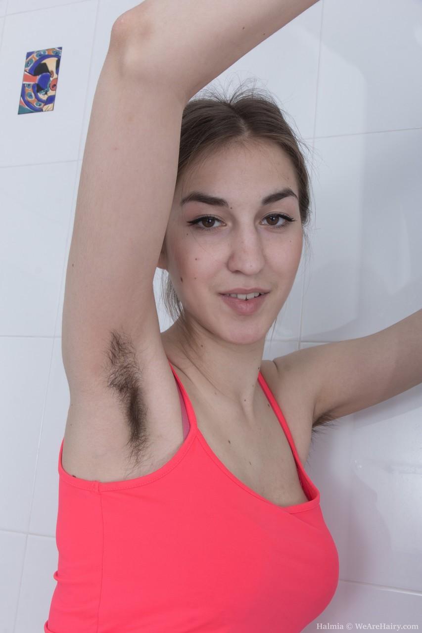 Hairy British thot Halmia washes herself and fingers her bushy beaver(1)