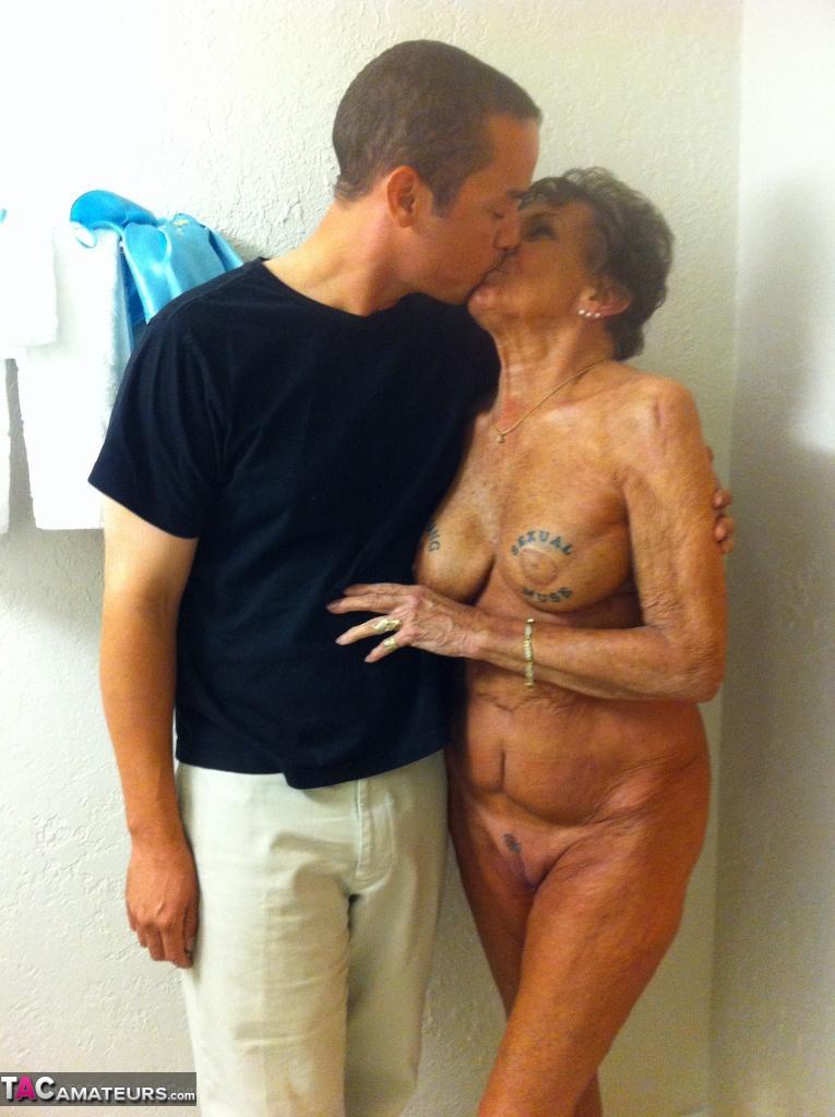 Dirty amateur granny shows her sexy naked body and kisses a young stud(16)