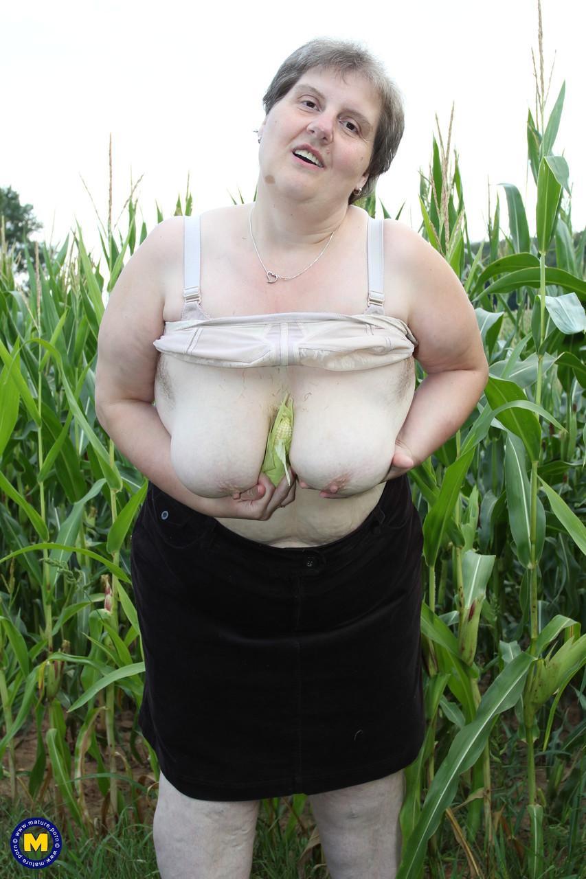 Plump European Tina C undresses in a corn field & masturbates her mature cunt(2)