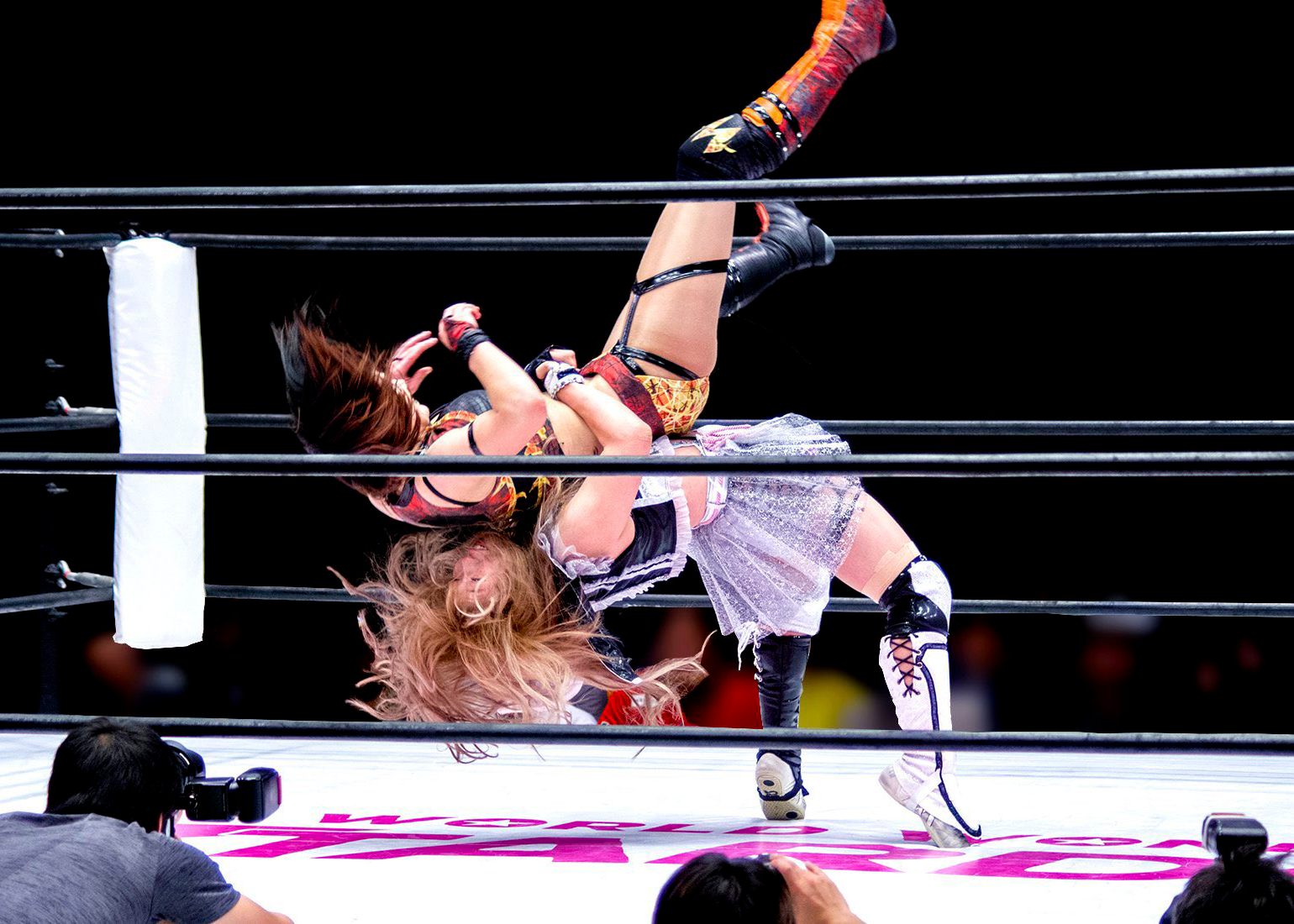 an image of tam nakano suplexing kairi