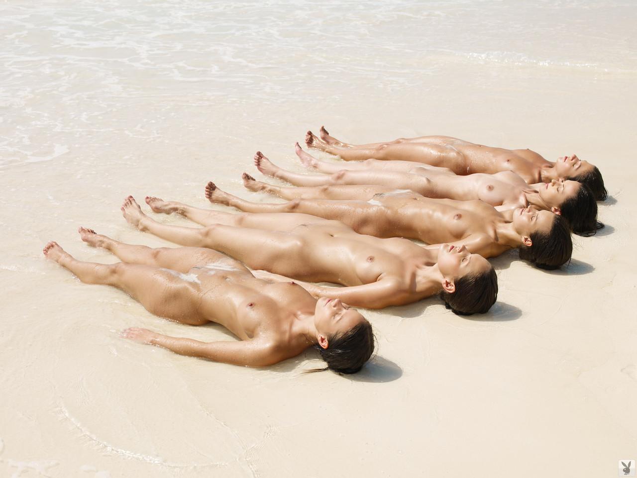 A gaggle of super sexy centerfolds posing naked & tribbing hotly at the beach(10)