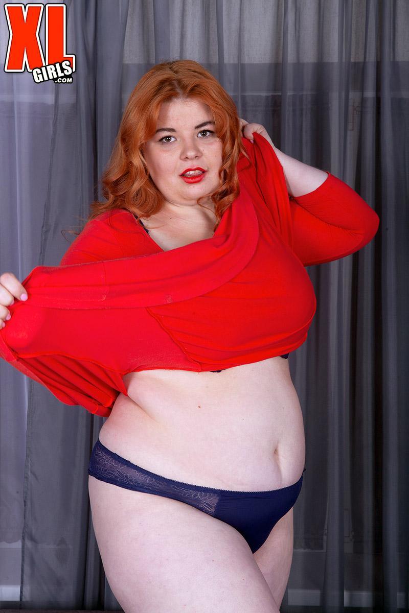 Fat redhead Loida holds her huge boobs after removing red dress and lingerie(4)