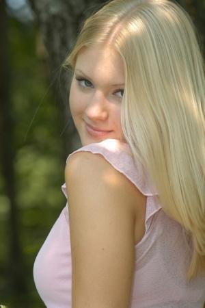 Charming blonde teen Tiffany hikes skirt over cotton panties in the forest