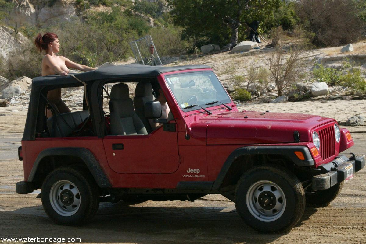 Sexy MILF with amazing breasts Sasha Monet gets tied naked to a Jeep(12)