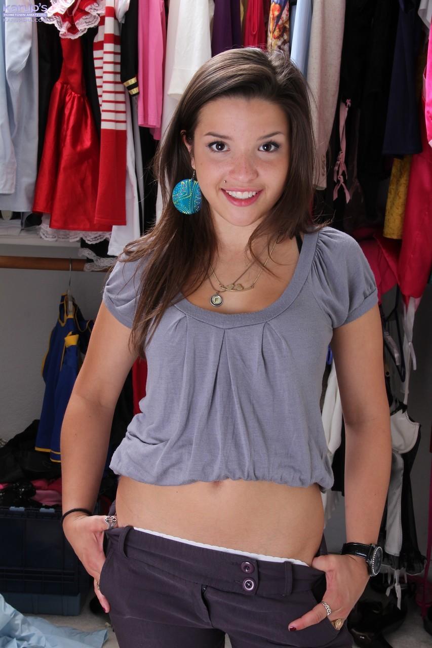 Charming teen Veronica Berry strips in the closet and spreads her pussy(5)