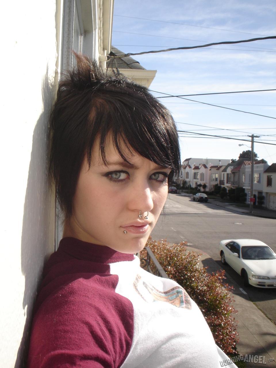 Short-haired punk chick with pierced nose, lip, navel in her own photos(1)