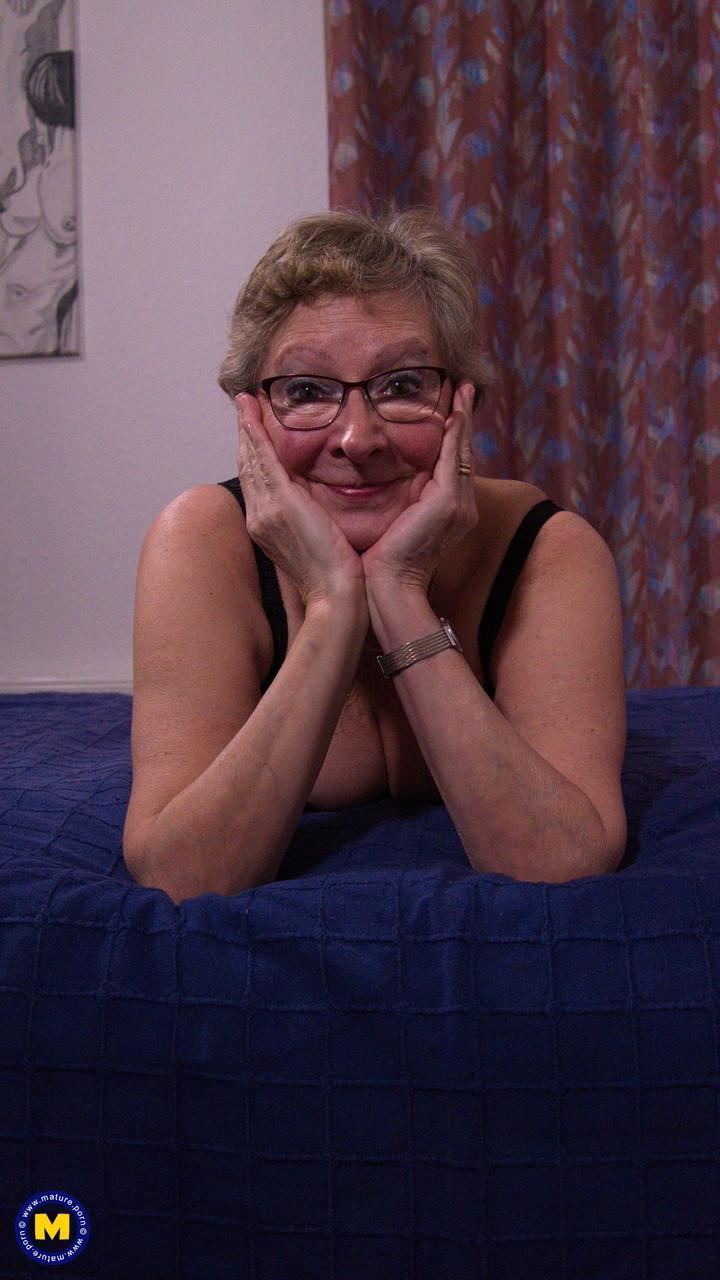 Chubby German granny Angie teasing in black lingerie & stockings(4)