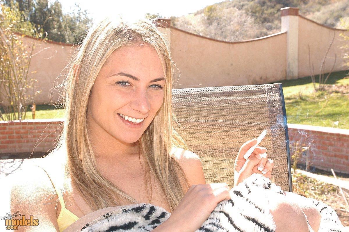 Blue eyed blonde Tyler Stevenz exposes her tiny tits during candid action(2)