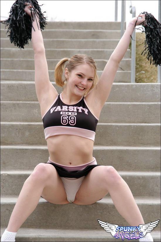 18 year old amateur flashes her upskirt panties in cheerleader outfit(7)