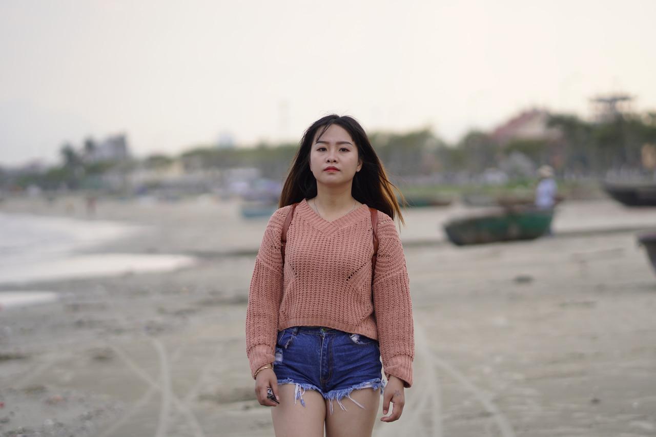 Stunning Asian babe poses in her jean shorts & sweater in public(3)